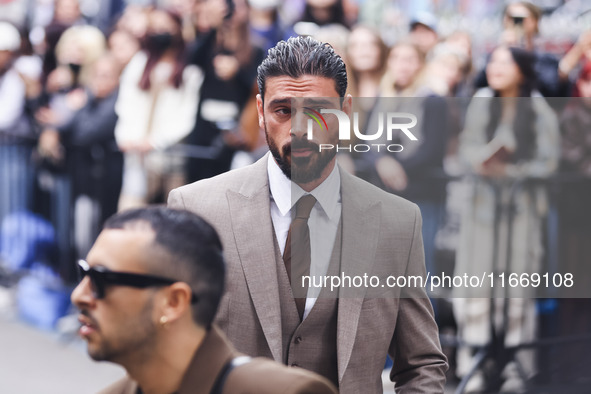 Michele Morrone attends the Boss Fashion Show during the Milan Womenswear Spring/Summer 2025 in Milan, Italy, on September 18, 2024 