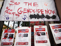 Pro-Palestinian banners are hanging on a fence during occupational strike in the yard of Jagiellonian University in Krakow, Poland on Octobe...