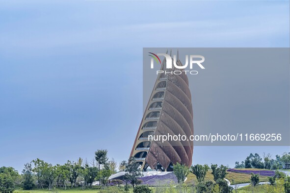 A 69.8-meter-high giant panda tower stands at the Chengdu Research Base of Giant Panda Breeding in Chengdu, China, on October 14, 2024. Repo...