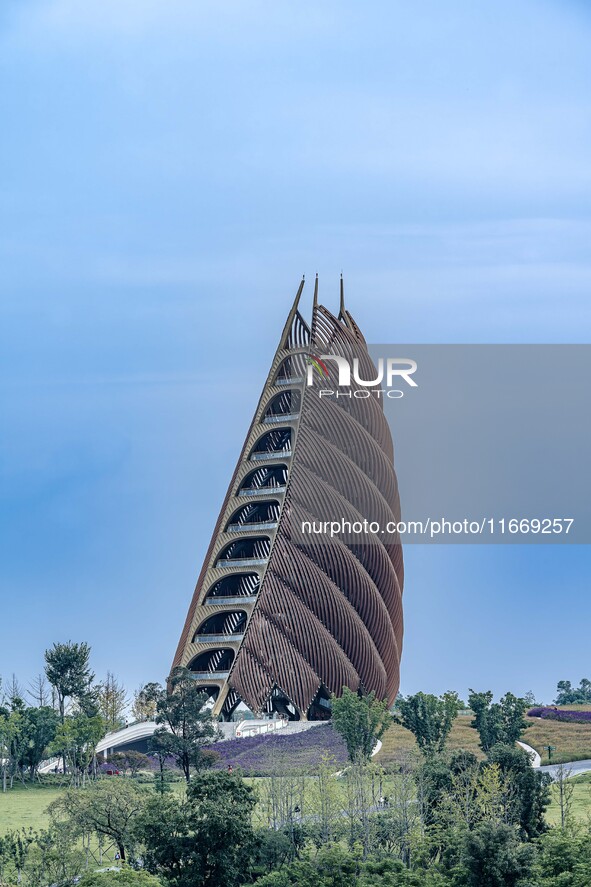 A 69.8-meter-high giant panda tower stands at the Chengdu Research Base of Giant Panda Breeding in Chengdu, China, on October 14, 2024. Repo...