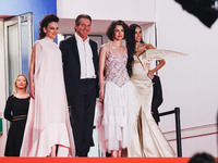 Dennis Quaid, Coralie Fargeat, Margaret Qualley, and Demi Moore attend the red carpet for the premiere of The Substance during the 77th Fest...