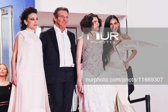 Dennis Quaid, Coralie Fargeat, Margaret Qualley, and Demi Moore attend the red carpet for the premiere of The Substance during the 77th Fest...