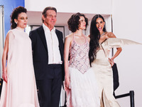 Dennis Quaid, Coralie Fargeat, Margaret Qualley, and Demi Moore attend the red carpet for the premiere of The Substance during the 77th Fest...