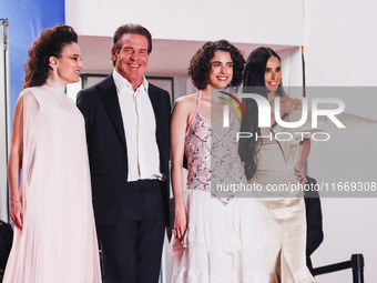 Dennis Quaid, Coralie Fargeat, Margaret Qualley, and Demi Moore attend the red carpet for the premiere of The Substance during the 77th Fest...