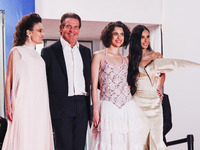 Dennis Quaid, Coralie Fargeat, Margaret Qualley, and Demi Moore attend the red carpet for the premiere of The Substance during the 77th Fest...