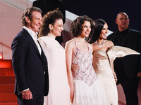 Dennis Quaid, Coralie Fargeat, Margaret Qualley, and Demi Moore attend the red carpet for the premiere of The Substance during the 77th Fest...