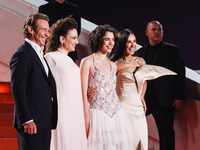 Dennis Quaid, Coralie Fargeat, Margaret Qualley, and Demi Moore attend the red carpet for the premiere of The Substance during the 77th Fest...