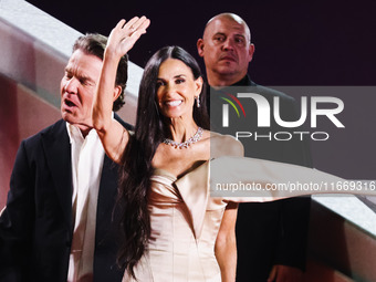 Demi Moore and Dennis Quaid attend the red carpet for the premiere of The Substance during the 77th Festival de Cannes in Cannes, France, on...