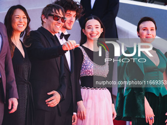 Sean Baker and Mikey Madison attend the red carpet for the premiere of Anora during the 77th Festival de Cannes in Cannes, France, on May 21...