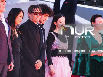 Sean Baker and Mikey Madison attend the red carpet for the premiere of Anora during the 77th Festival de Cannes in Cannes, France, on May 21...