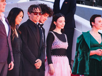 Sean Baker and Mikey Madison attend the red carpet for the premiere of Anora during the 77th Festival de Cannes in Cannes, France, on May 21...