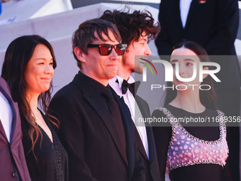 Sean Baker and Mikey Madison attend the red carpet for the premiere of Anora during the 77th Festival de Cannes in Cannes, France, on May 21...