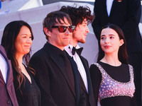 Sean Baker and Mikey Madison attend the red carpet for the premiere of Anora during the 77th Festival de Cannes in Cannes, France, on May 21...