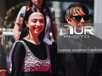 Sean Baker and Mikey Madison attend the red carpet for the premiere of Anora during the 77th Festival de Cannes in Cannes, France, on May 21...