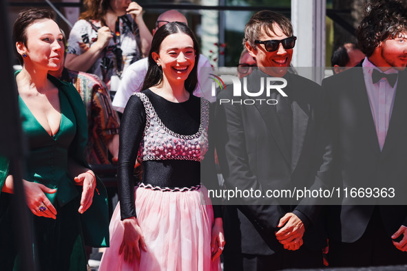 Sean Baker and Mikey Madison attend the red carpet for the premiere of Anora during the 77th Festival de Cannes in Cannes, France, on May 21...