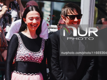 Sean Baker and Mikey Madison attend the red carpet for the premiere of Anora during the 77th Festival de Cannes in Cannes, France, on May 21...