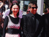 Sean Baker and Mikey Madison attend the red carpet for the premiere of Anora during the 77th Festival de Cannes in Cannes, France, on May 21...