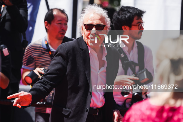 Abel Ferrara attends the red carpet for the premiere of Anora during the 77th Festival de Cannes in Cannes, France, on May 21, 2024 