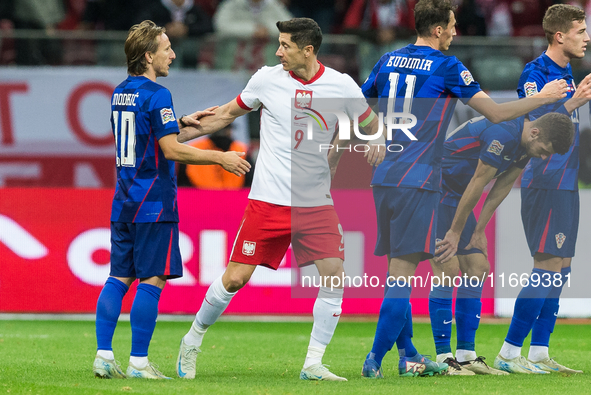 Luka Modric , Robert Lewandowski , Ante Budimir  during UEFA Nations League match Poland vs Croatia in Warsaw Poland on 15 October 2024. 