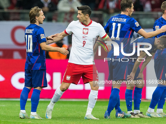 Luka Modric , Robert Lewandowski , Ante Budimir  during UEFA Nations League match Poland vs Croatia in Warsaw Poland on 15 October 2024. (