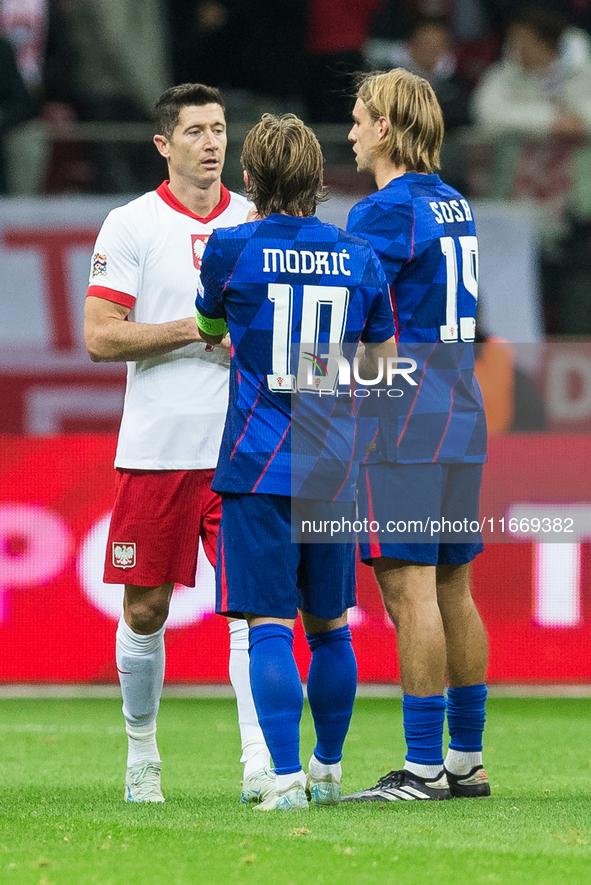 Robert Lewandowski , Luka Modric , Borna Sosa  during UEFA Nations League match Poland vs Croatia in Warsaw Poland on 15 October 2024. 