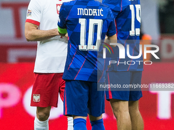 Robert Lewandowski , Luka Modric , Borna Sosa  during UEFA Nations League match Poland vs Croatia in Warsaw Poland on 15 October 2024. (