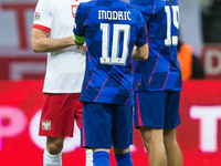 Robert Lewandowski , Luka Modric , Borna Sosa  during UEFA Nations League match Poland vs Croatia in Warsaw Poland on 15 October 2024. (