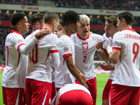 Michael Ameyaw , Sebastian Szymanski , Maximillian Oyedele , Kamil Piatkowski , Jan Bednarek , Robert Lewandowski  during UEFA Nations Leagu...