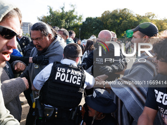 Indigenous demonstrators clash with police near the U.S. Capitol in Washington, D.C. on October 15, 2024 after U.S. Park Police attempt to c...