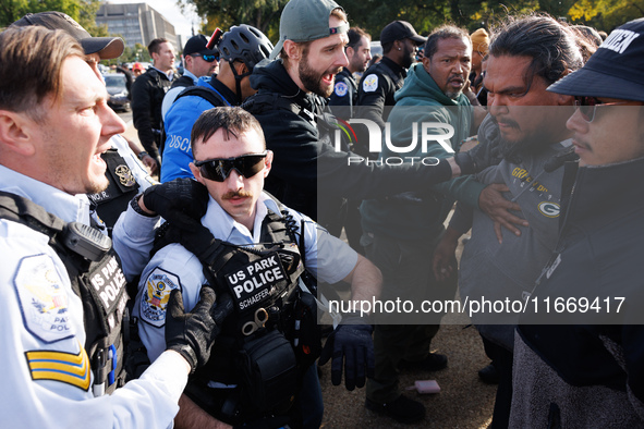 Indigenous demonstrators clash with police near the U.S. Capitol in Washington, D.C. on October 15, 2024 after U.S. Park Police attempt to c...