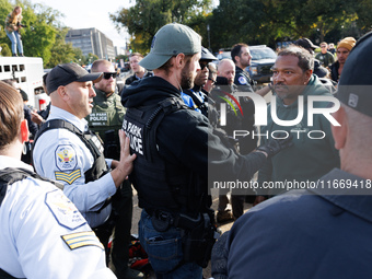 Indigenous demonstrators clash with police near the U.S. Capitol in Washington, D.C. on October 15, 2024 after U.S. Park Police attempt to c...