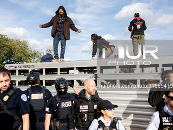 Indigenous demonstrators stand atop a horse trailer near the U.S. Capitol in Washington, D.C. on October 15, 2024 after U.S. Park Police att...