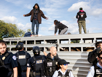 Indigenous demonstrators stand atop a horse trailer near the U.S. Capitol in Washington, D.C. on October 15, 2024 after U.S. Park Police att...