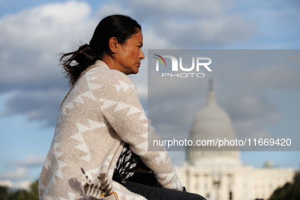 An Indigenous demonstrator sits atop a horse trailer near the U.S. Capitol in Washington, D.C. on October 15, 2024 after U.S. Park Police at...