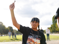 An Indigenous demonstrator holds burning sage near the U.S. Capitol in Washington, D.C. on October 15, 2024. after U.S. Park Police attempte...