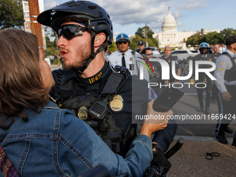 Indigenous demonstrators clash with police near the U.S. Capitol in Washington, D.C. on October 15, 2024 after U.S. Park Police attempt to c...