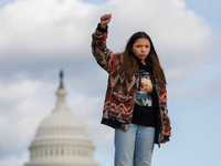 An Indigenous demonstrator stands atop a horse trailer near the U.S. Capitol in Washington, D.C. on October 15, 2024 after U.S. Park Police...