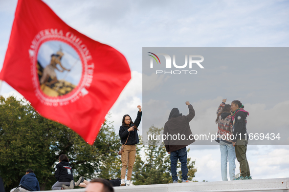 Indigenous demonstrators stand atop a horse trailer near the U.S. Capitol in Washington, D.C. on October 15, 2024 after U.S. Park Police att...