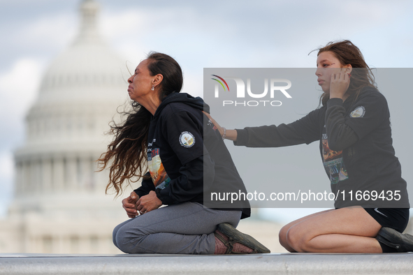 Indigenous demonstrators sit atop a horse trailer near the U.S. Capitol in Washington, D.C. on October 15, 2024 after clashing with U.S. Par...