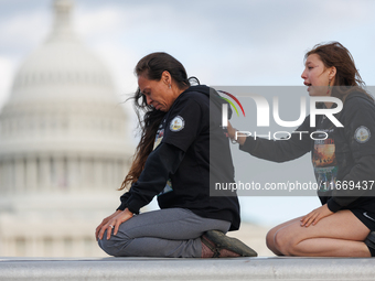 Indigenous demonstrators sit atop a horse trailer near the U.S. Capitol in Washington, D.C. on October 15, 2024 after clashing with U.S. Par...