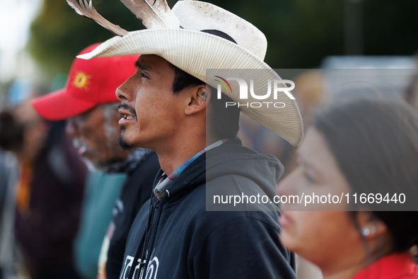 Indigenous demonstrators chant as police surround a horse trailer near the U.S. Capitol in Washington, D.C. on October 15, 2024. U.S. Park P...