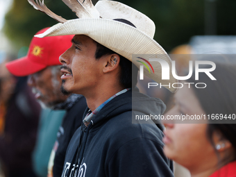 Indigenous demonstrators chant as police surround a horse trailer near the U.S. Capitol in Washington, D.C. on October 15, 2024. U.S. Park P...