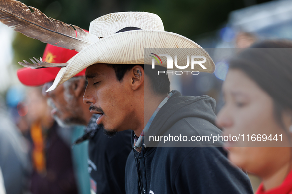 Indigenous demonstrators chant as police surround a horse trailer near the U.S. Capitol in Washington, D.C. on October 15, 2024. U.S. Park P...