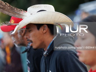 Indigenous demonstrators chant as police surround a horse trailer near the U.S. Capitol in Washington, D.C. on October 15, 2024. U.S. Park P...