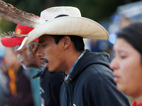 Indigenous demonstrators chant as police surround a horse trailer near the U.S. Capitol in Washington, D.C. on October 15, 2024. U.S. Park P...