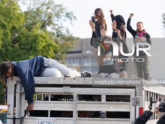 Indigenous demonstrators sit atop a horse trailer near the U.S. Capitol in Washington, D.C. on October 15, 2024 after clashing with U.S. Par...