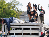 Indigenous demonstrators sit atop a horse trailer near the U.S. Capitol in Washington, D.C. on October 15, 2024 after clashing with U.S. Par...