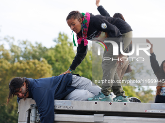 Indigenous demonstrators sit atop a horse trailer near the U.S. Capitol in Washington, D.C. on October 15, 2024 after clashing with U.S. Par...