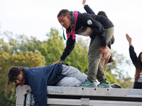 Indigenous demonstrators sit atop a horse trailer near the U.S. Capitol in Washington, D.C. on October 15, 2024 after clashing with U.S. Par...