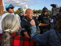 Indigenous demonstrators clash with police near the U.S. Capitol in Washington, D.C. on October 15, 2024 after U.S. Park Police attempt to c...